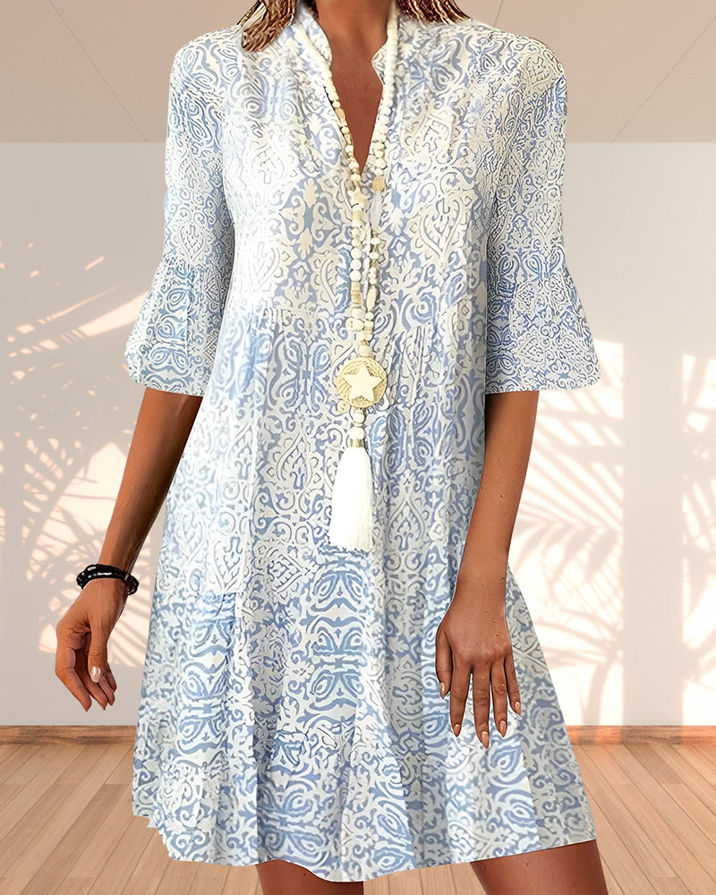 Robe élégante en imprimé avec demi-manche