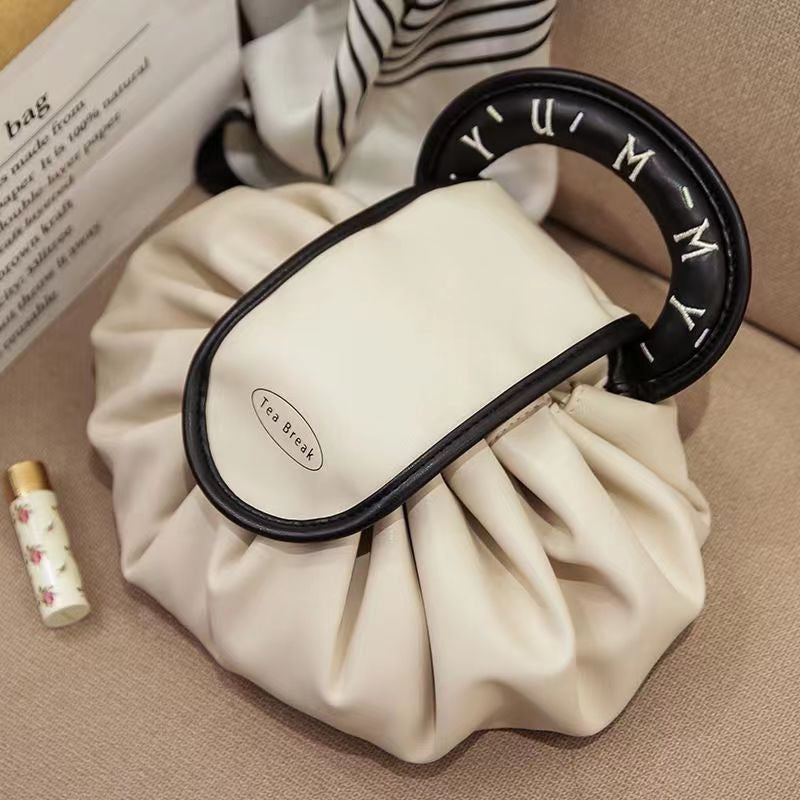 Sac à main avec cordon de serrage pour le maquillage