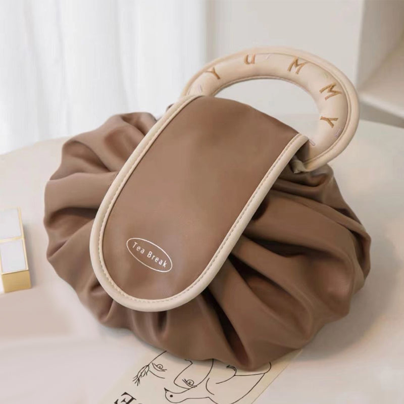 Sac à main avec cordon de serrage pour le maquillage