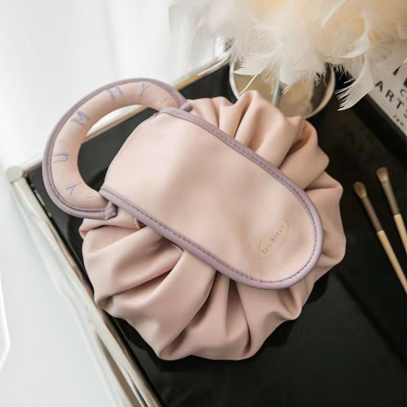 Sac à main avec cordon de serrage pour le maquillage