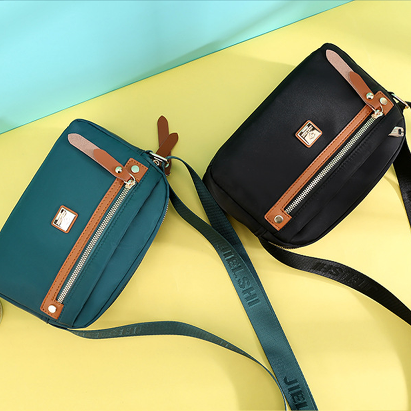 Sac à bandoulière de voyage décontracté en nylon uni