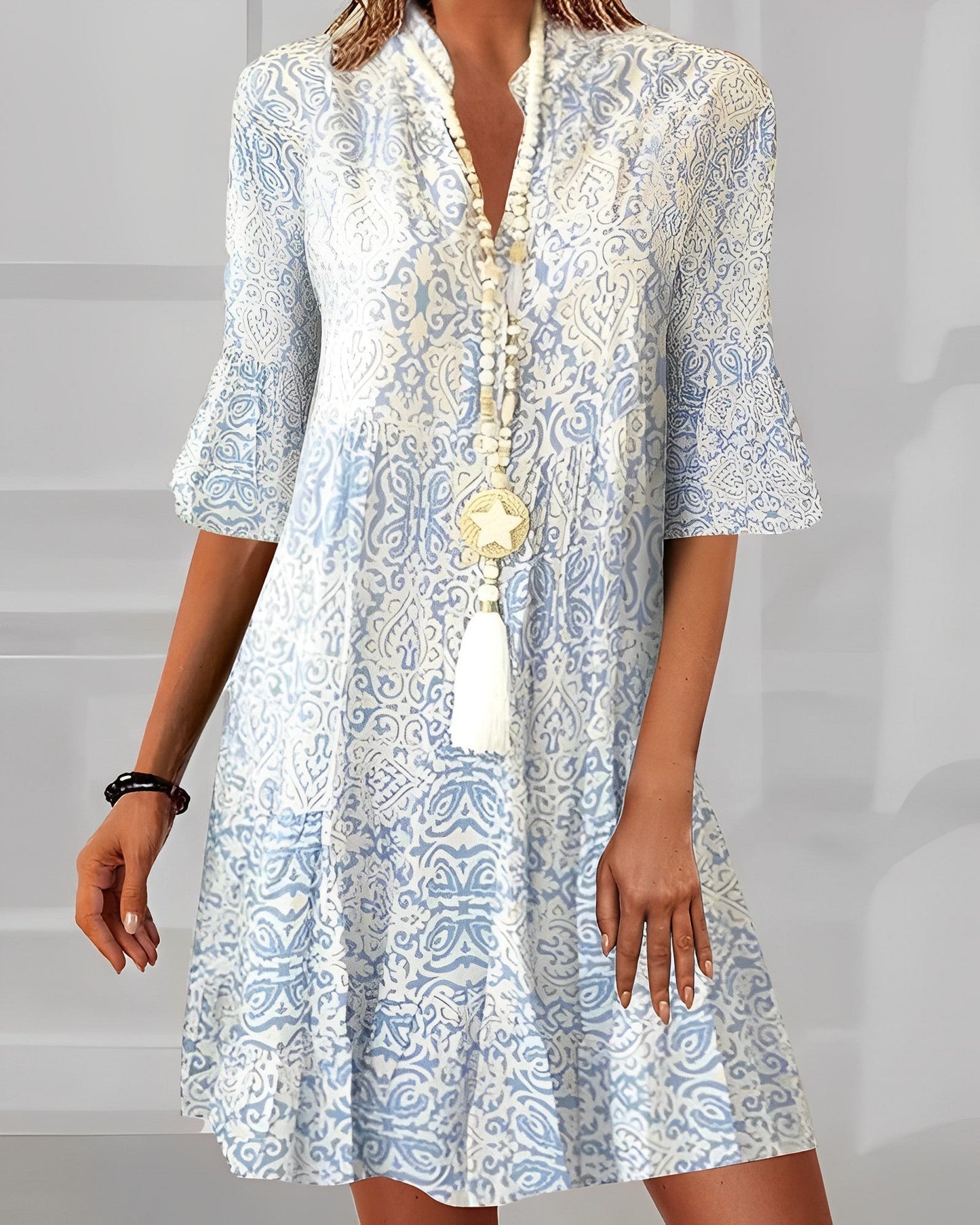 Robe élégante en imprimé avec demi-manche