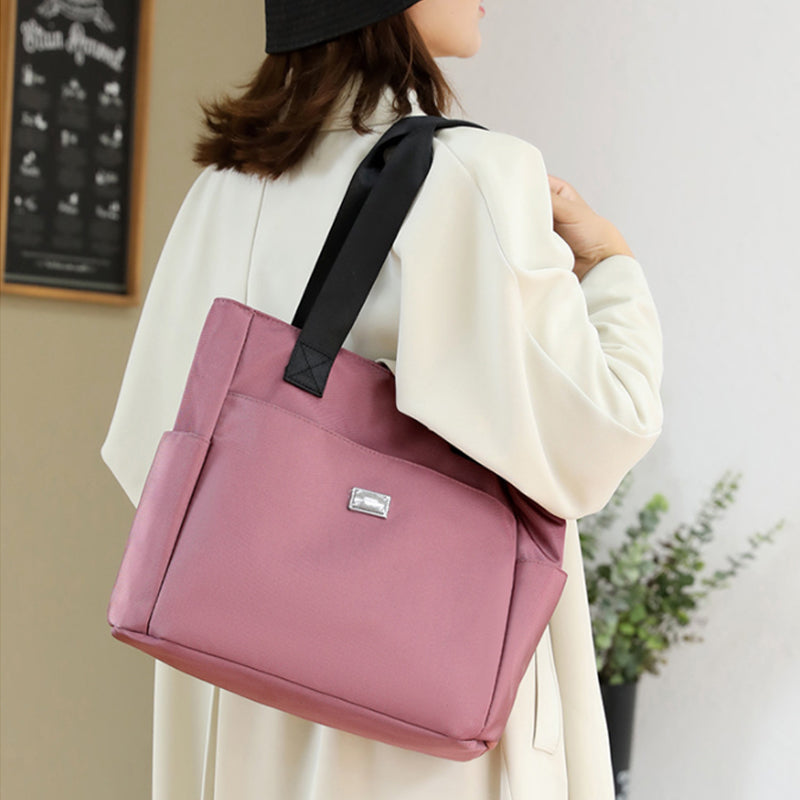 Sac à main polyvalent simple en nylon de couleur unie avec une grande capacité