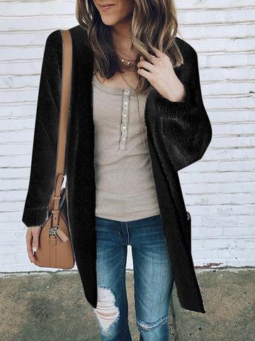 Gilet mi-long en peluche
