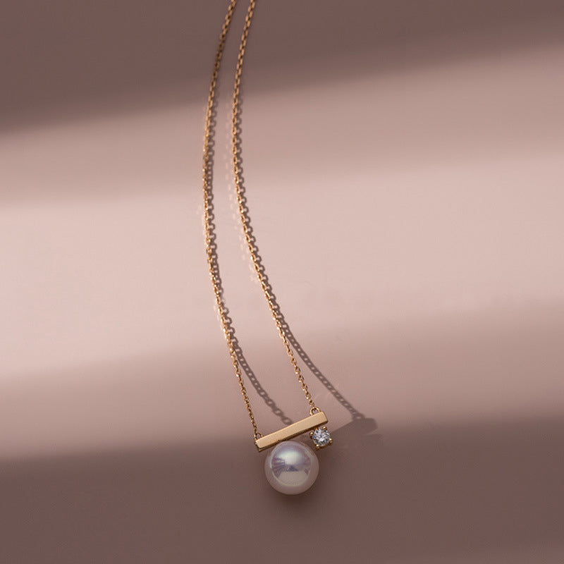 Collier avec pendentif en perle
