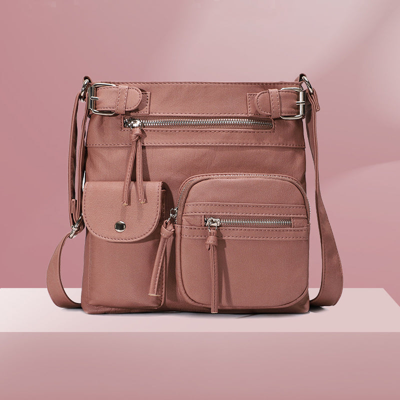 Sac à bandoulière en cuir souple avec plusieurs poches