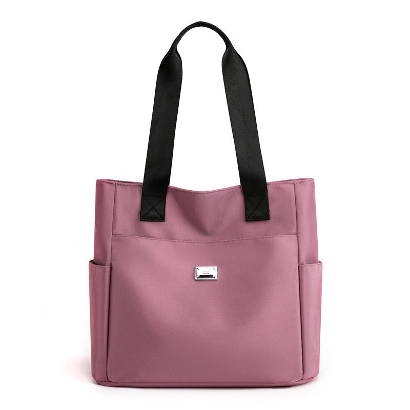 Sac à main polyvalent simple en nylon de couleur unie avec une grande capacité