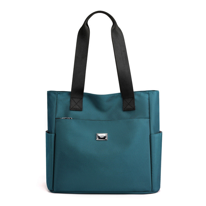Sac à main polyvalent simple en nylon de couleur unie avec une grande capacité