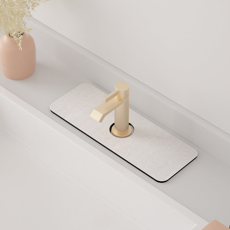 Tampon absorbant pour robinet de boue de diatomée