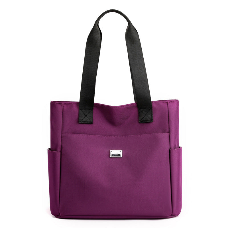 Sac à main polyvalent simple en nylon de couleur unie avec une grande capacité