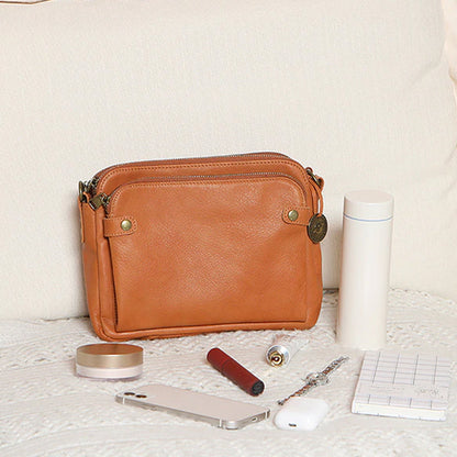 Sac à bandoulière et pochette en cuir à trois couches