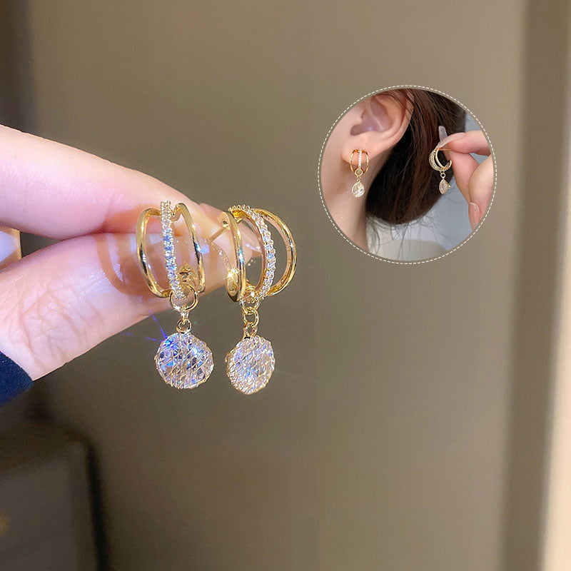 Boucles d'oreilles à la mode avec couronne de diamants
