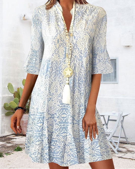 Robe élégante en imprimé avec demi-manche