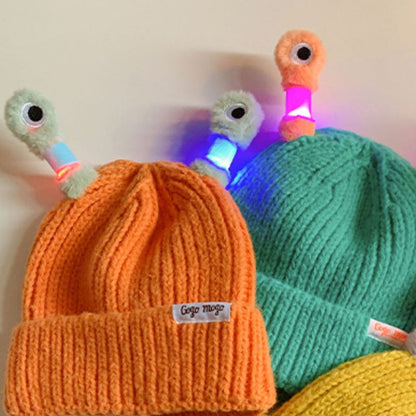 Petit bonnet de monstre lumineux