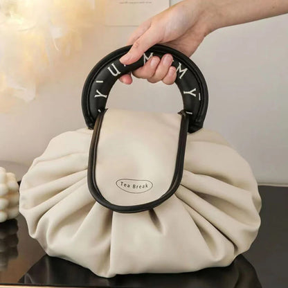Sac à main avec cordon de serrage pour le maquillage