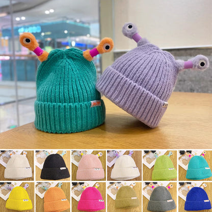 Petit bonnet de monstre lumineux