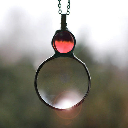 Collier pendentif grande loupe