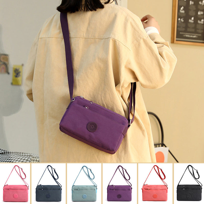 Sac à bandoulière simple en nylon à la mode multicouche décontracté pour dames