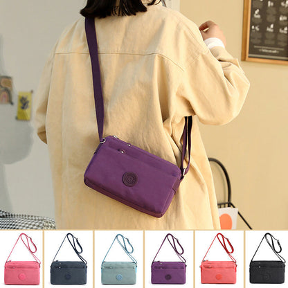Sac à bandoulière simple en nylon à la mode multicouche décontracté pour dames