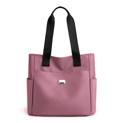 Sac à main polyvalent simple en nylon de couleur unie avec une grande capacité