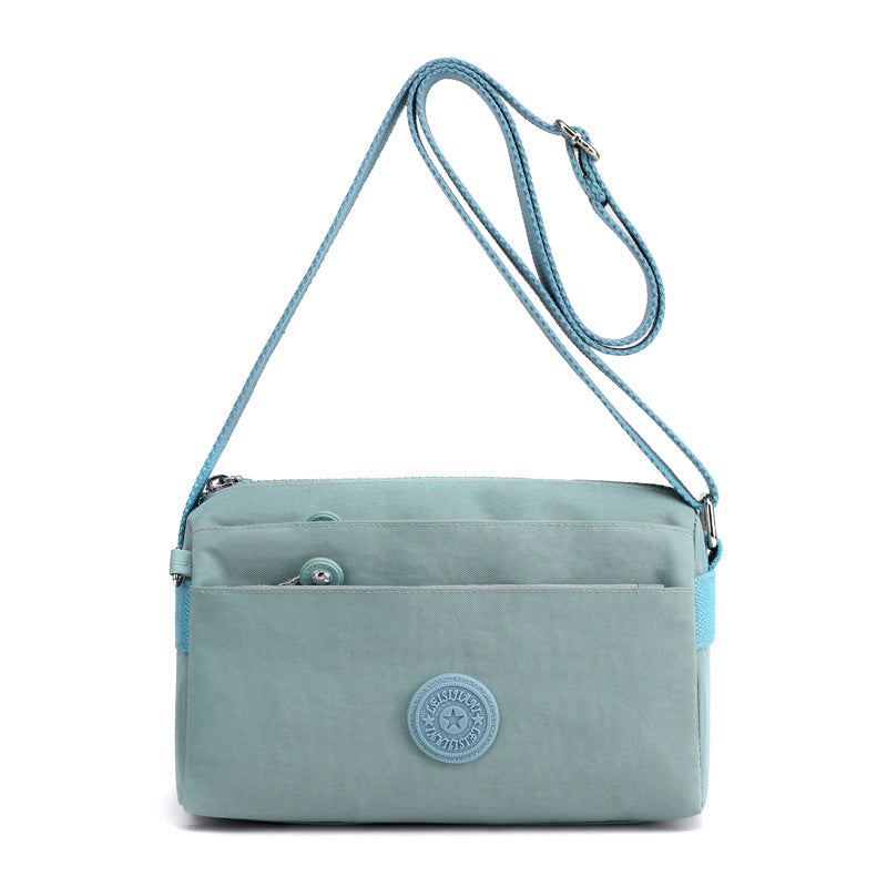 Sac à bandoulière simple en nylon à la mode multicouche décontracté pour dames