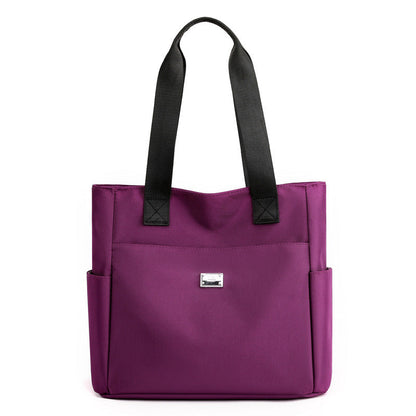 Sac à main polyvalent simple en nylon de couleur unie avec une grande capacité