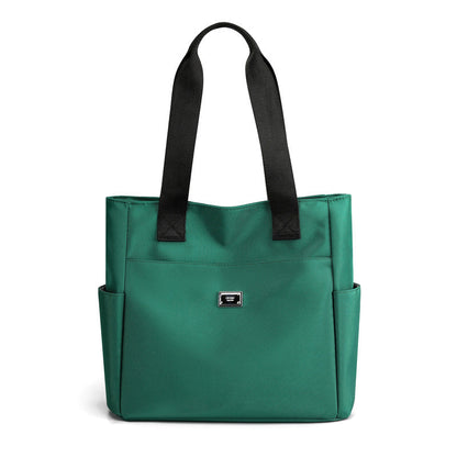 Sac à main polyvalent simple en nylon de couleur unie avec une grande capacité