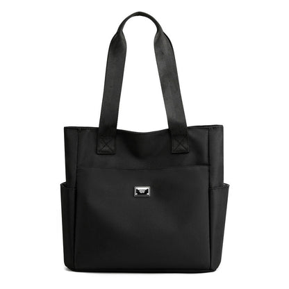 Sac à main polyvalent simple en nylon de couleur unie avec une grande capacité